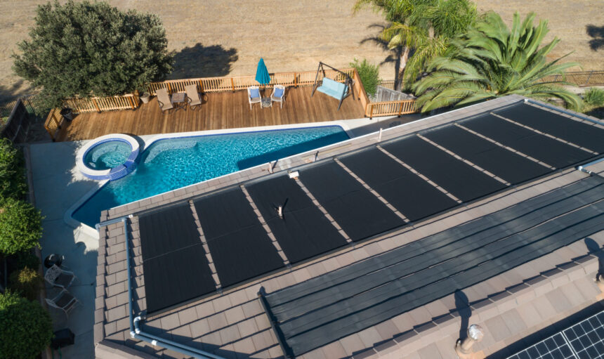 Thermal Solar Panels Installed on the Roof of a Large House.