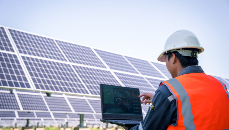 The solar farm(solar panel) with engineers check the operation of the system, Alternative energy to conserve the world's energy, Photovoltaic module idea for clean energy production.